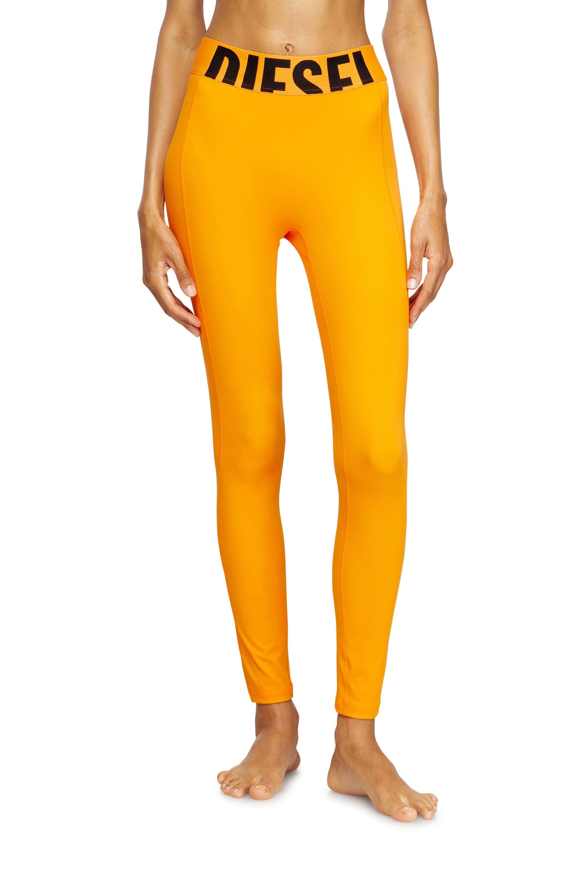 Diesel - Microfibre leggings with cut-off logo - Pants - Woman - Orange